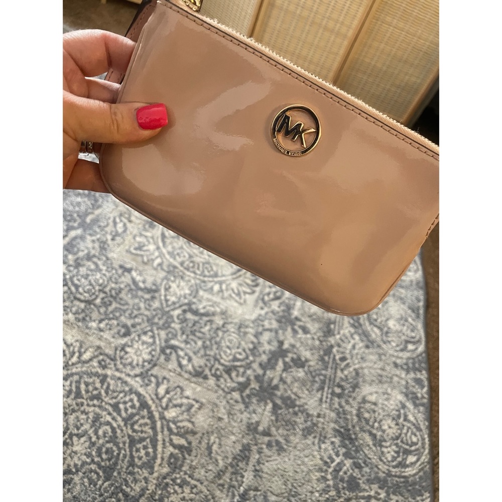 Michael Kors, pink wristlet . Blush pink